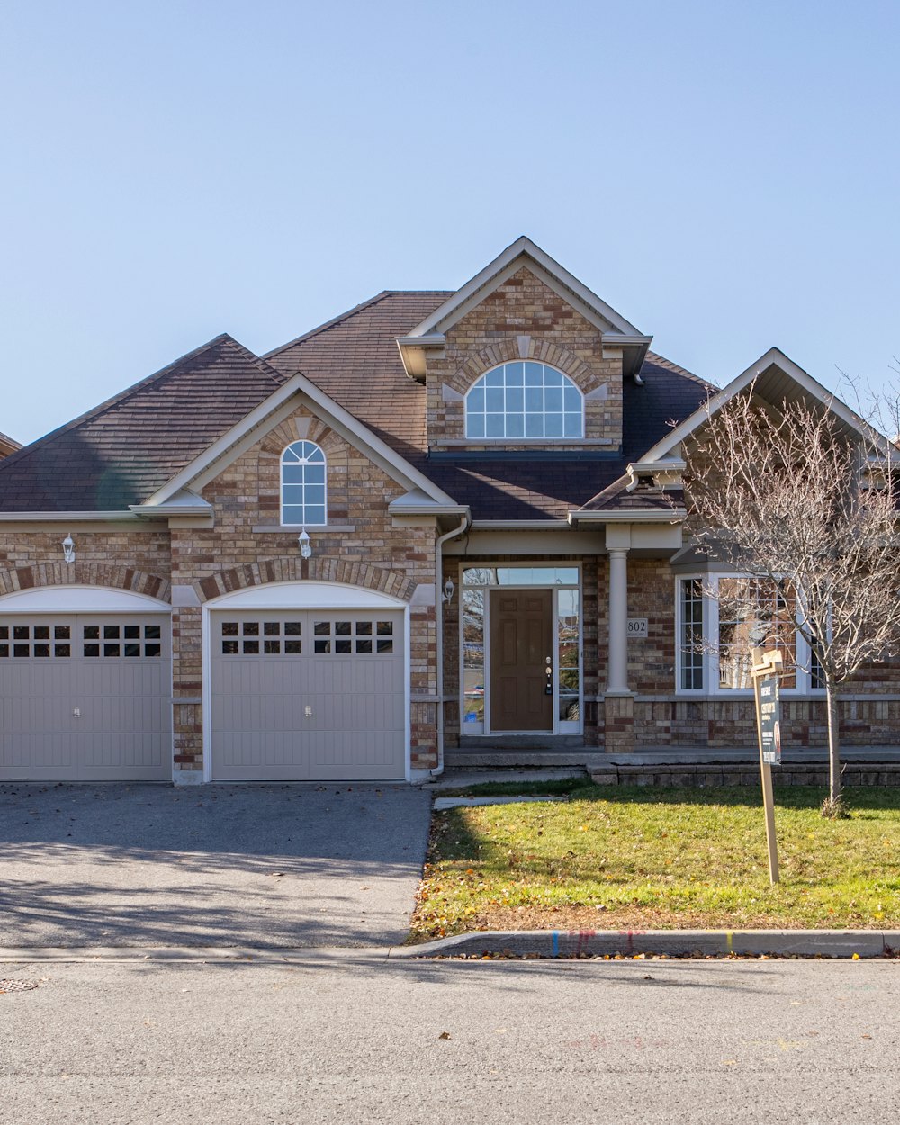 Brick homes on a leafy street in Wortley Village