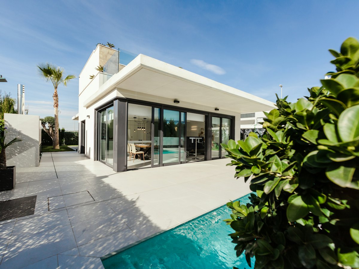 Modern home with a courtyard pool